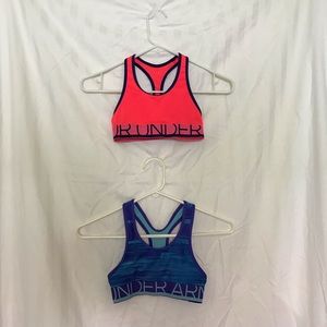TWO PINK AND BLUE UNDER ARMOUR SPORTS BRAS